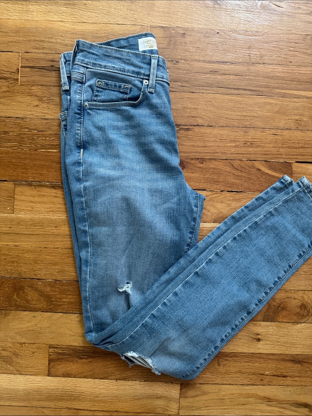 Levi's Light Blue Women's Skinny Jeans with Subtle Distress
